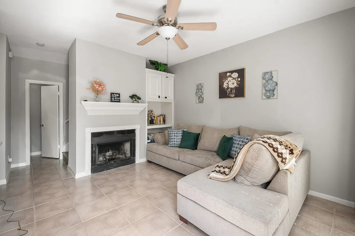 Inviting living room with a sofa, coffee table, and warm home details